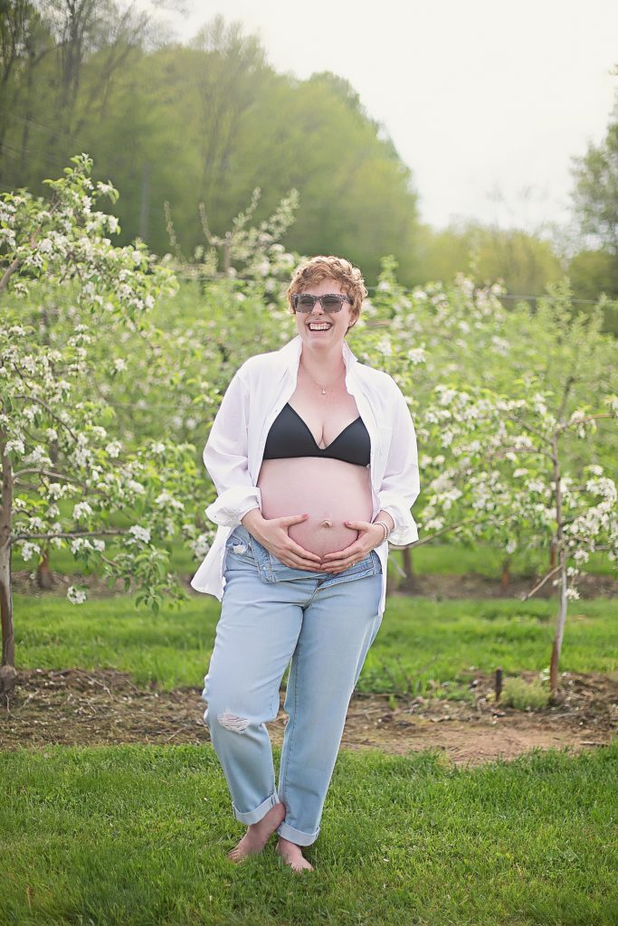 maternity photos in jeans and white button down